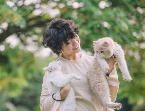 Resident with pets at Lunar Seputeh pet-friendly community space, lifestyle photo